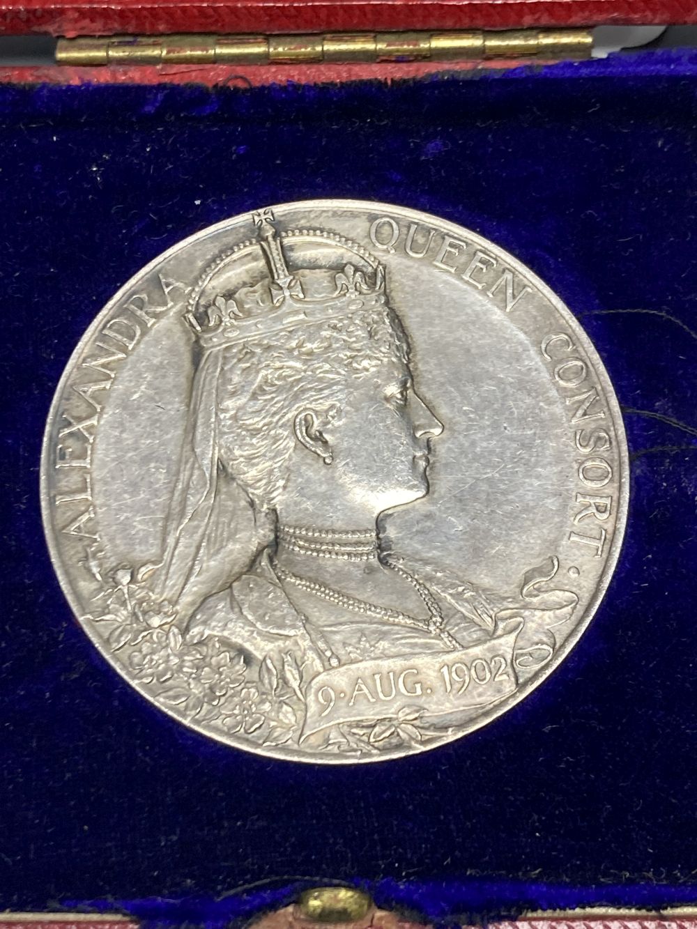 An Edward VII coronation medallion by George William DeSaulle, 55mm, 86g, uncased, GVF